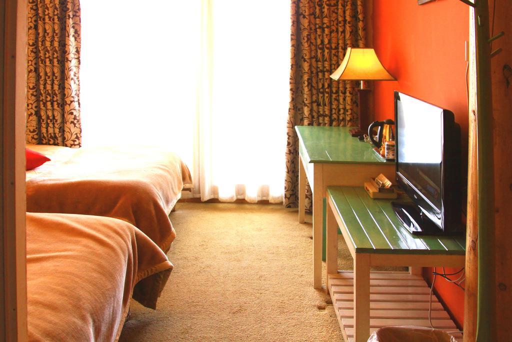Shangri-La Lao Shay Youth Hostel Extérieur photo