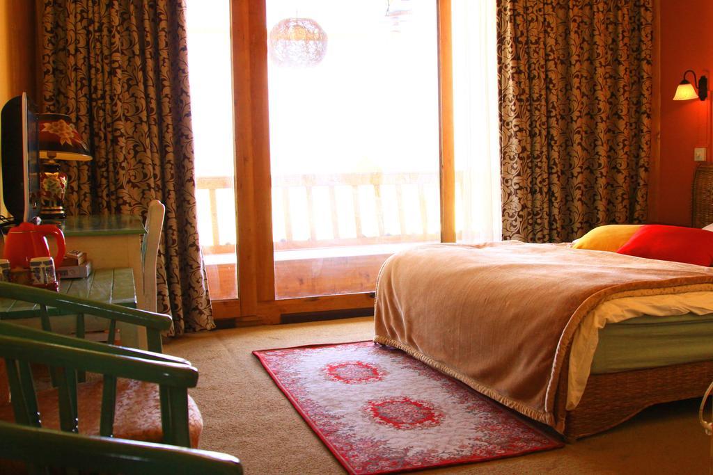 Shangri-La Lao Shay Youth Hostel Extérieur photo