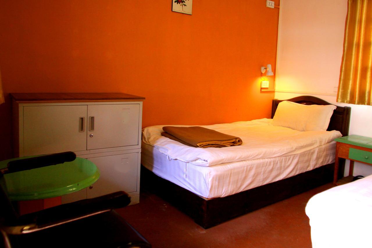 Shangri-La Lao Shay Youth Hostel Extérieur photo