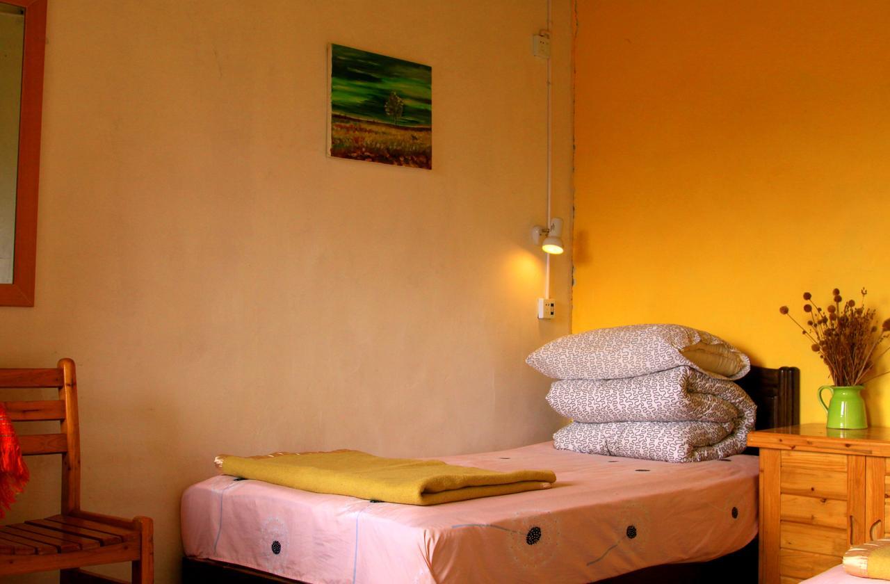 Shangri-La Lao Shay Youth Hostel Extérieur photo